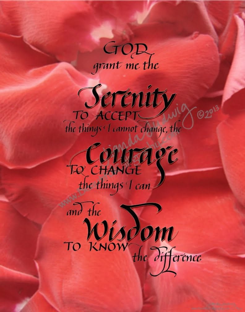 The Serenity Prayer by Reinhold Niebuhr written in calligraphy on a background of red rose petals