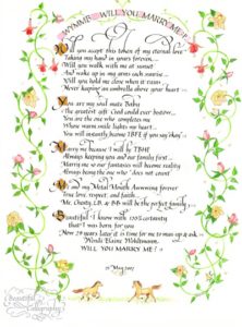 A handwritten marriage proposal in calligraphy with original artwork and images requested by the couple