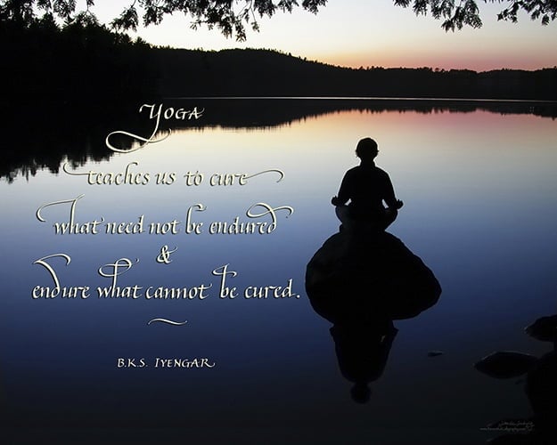 yoga quote in calligraphy on beautiful background with meditating woman