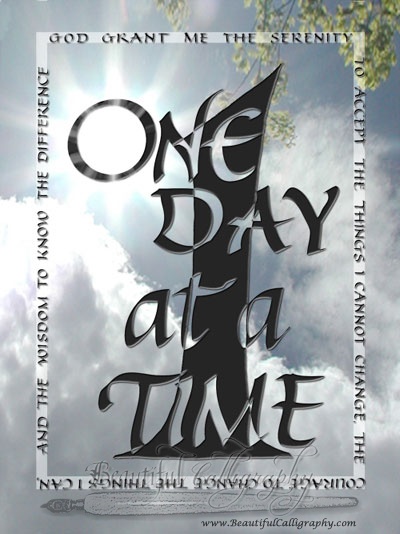 One Day At A Time written in a calligraphy design